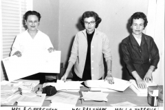 Juanita Ferguson (Mrs. R. O.), Mrs. Ray Shape, Mrs. L. O. Sorrells.  Collating papers for a project in 1960.