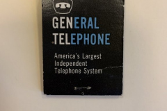 Blue and black General Telephone matchbook advertising the new STARLITE phone, with lights. The Starlite telephone debuted in 1960 and was produced until 1982.