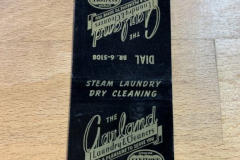 Black The Garland Laundry and Cleaners matchbook. Lists their address as 101 N. Star Rd., Garland, TX.