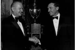 Award being presented to Dr. Robert Speegle - Cup reads "Big Game Trophy 1975"