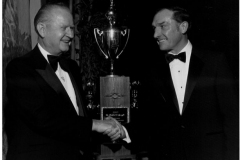 Award being presented to Dr. Robert Speegle - Cup reads "Big Game Trophy 1975"