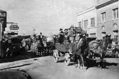 Wagons on the way to Santa Fe Depot with children who took a train ride to Wylie.