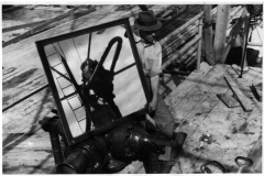 Oil field equipment and worker.