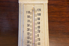 S and L Automatic Transmission Service advertising thermometer.