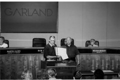 District 8 council representative Randall Dunning (L) and Mayor Bob Day display a certificate of appreciation