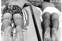 "Sunseekers" - two male sunbathers at Holford Pool, 1971