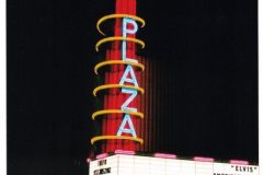 Plaza Theater with neon marquee at night
