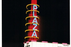 Plaza Theater with neon marquee at night
