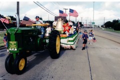Star Spangled Fourth 1999 - John Deere tractor pulling Liberty Bell float