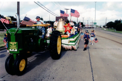 Star Spangled Fourth 1999 - John Deere tractor pulling Liberty Bell float