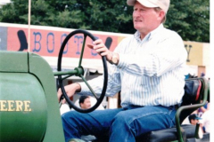 Star Spangled Fourth 1997 - John Deere tractor and driver in parade