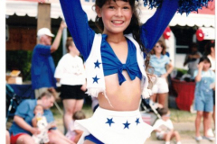 Star Spangled Fourth 1997 - Little girl dressed as Dallas Cowboys cheerleader in parade
