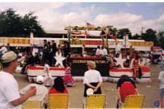 Star Spangled Fourth 1997 - Parade float titled "Celebrating Culture" with Mariachi and African music bands.