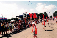 Star Spangled Fourth 1999 - Parade with red flags and balloons