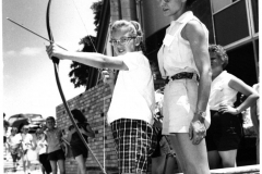 Camp Gatewood Archery 1970 - Child being taught to use bow and arrow
