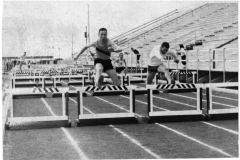 Track meet at Williams Stadium - Jumping hurdles circa 1970