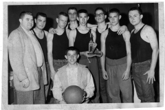 Basketball players with trophy circa 1970