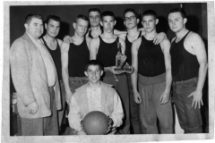 Basketball players with trophy circa 1970