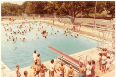 Diving and swimming at the Wynn public pool in Pecan Grove Park