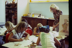 Youth crafts class at Holford Park Gymnasium - children drawing and coloring with crayons