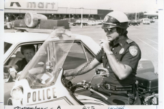 Two policemen in Kmart parking lot (now Garland Towne Center)