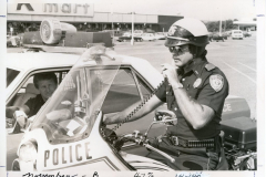 Two policemen in Kmart parking lot (now Garland Towne Center)