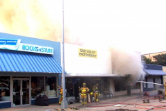 Fire at the Sew What Embroidery store in the downtown Garland Square. Originally Cannon Dry Goods. August 12, 2003 Books n' Stuff, Gary Holley Photography