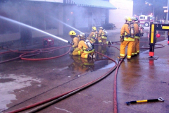Fire at the Sew What Embroidery store in the downtown Garland Square. Originally Cannon Dry Goods. August 12, 2003 State Street