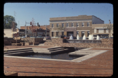 West side of square showing The Hip Pocket Sandwich Shoppe and Accent Lighting and Mirrors