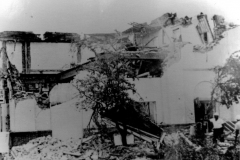 Demolition of the original Nicholson Library location at 100 Sixth Street, on the north east side of the square, on July 13, 1973. Originally Citizen's National Bank, the first floor housed the library and the second was a community center.