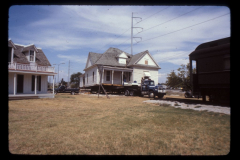 Pace House being moved to Museum Plaza, behind City Hall, to rest next to the Lyles House and Pullman Railcar.