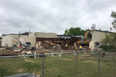 Razing of the building on the east side of the Square