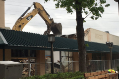 Razing of the building on the east side of the Square