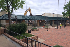 Razing of the building on the east side of the Square