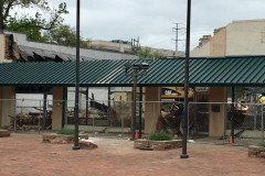 Razing of the building on the east side of the Square