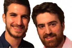 Two little boys wearing patriotic colors in stroller - Star Spangled Fourth 1998