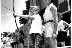 Camp Gatewood Archery 1970 - Child being taught to use bow and arrow