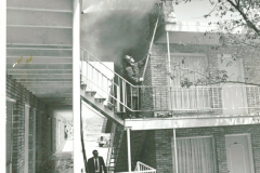 Firefighters at apartment fire on Miller Rd. in April 1973