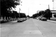 Central library on the left at 625 Austin Street, Four story building at 217 N. Fifth Street on the right, photo taken on Austin Street facing east.