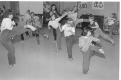 Karate classes, children and teacher in photograph
