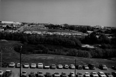 Pictured is the view looking north from the roof of City Hall. The vacant land is now the site of the Performing Arts Center.