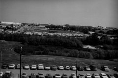 Pictured is the view looking north from the roof of City Hall. The vacant land is now the site of the Performing Arts Center.