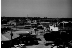 Pictured is the view looking south from City Hall roof. Roach Feed and Seed is in the foreground to the left.