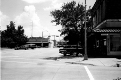 Intersection of Sixth and State Streets looking ssouth. Antiques store on the right, square on the left, early 1990's.