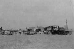 Chumley Farm.  Rumely Oil Pull Tractor towing two horse-drawn grain binders to harvest grain.