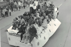 Teenagers on a YMCA float in the Garland Christmas Parade.