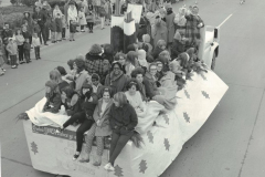 Teenagers on a YMCA float in the Garland Christmas Parade.