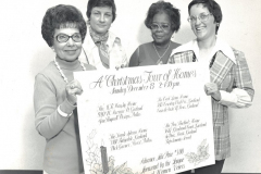 Members of the League of Women Voters with a poster for 'A Christmas Tour of Homes'. L-R: 1. Frances Brown 2. 3. 4.