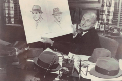 Harry Rolnick with sketches of Presidents Richard M. Nixon and John F. Kennedy in hats.