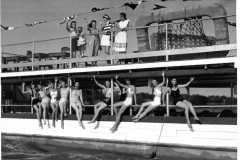 Bathing beauties on barge at White Rock Lake